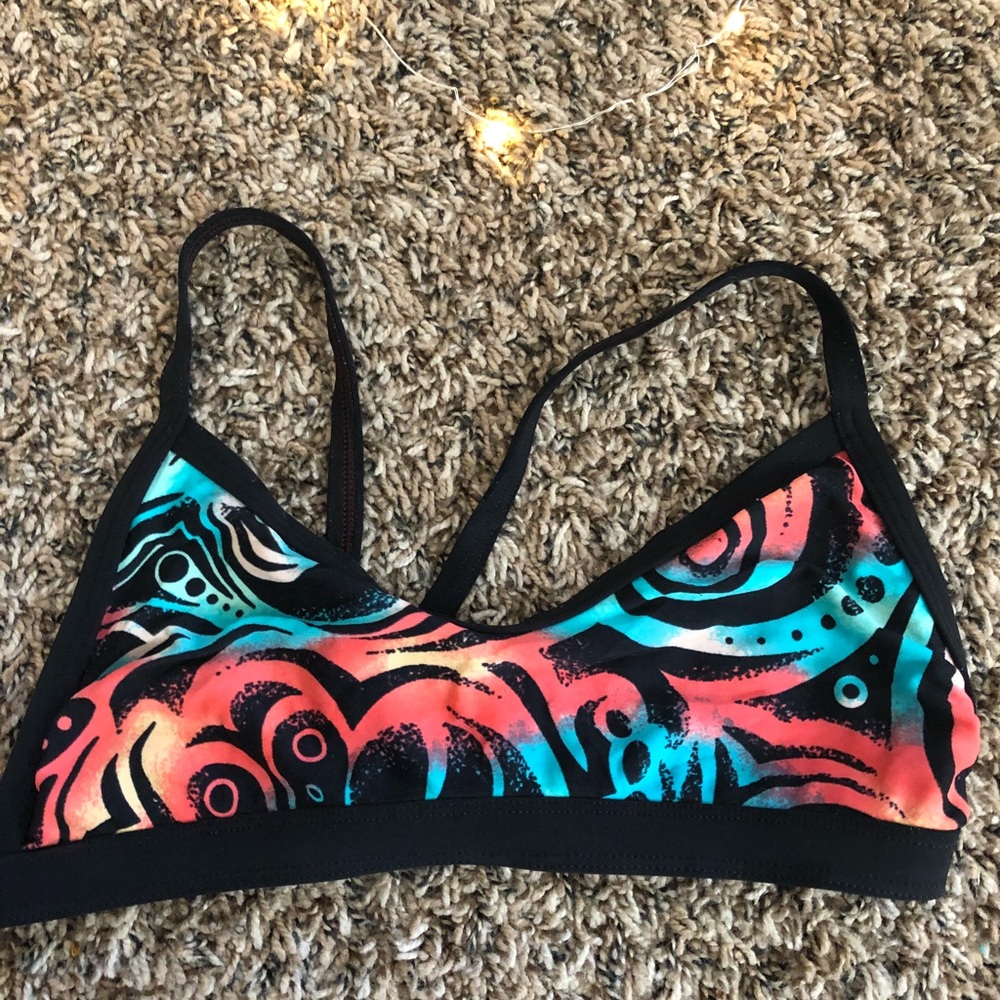 Reversible suit top
